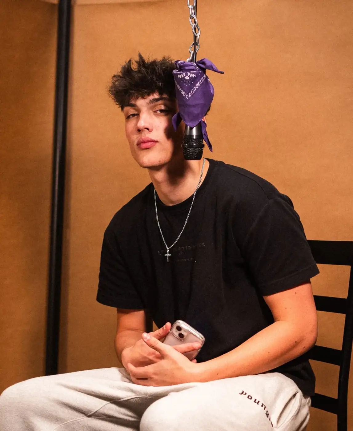 At the microphone