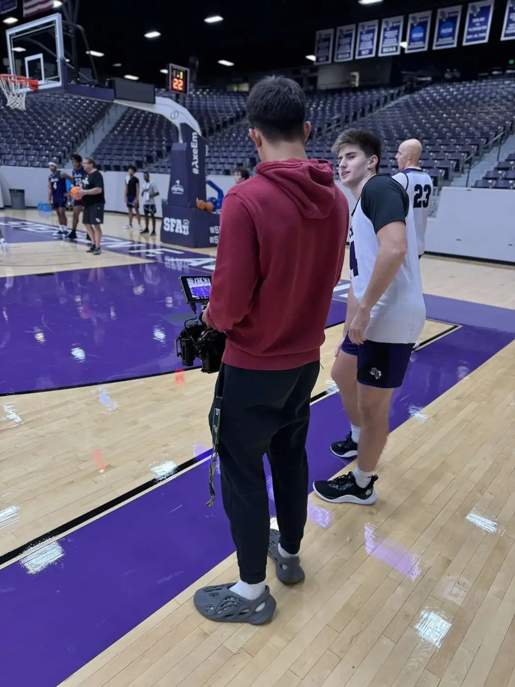 Filming on the basketball court